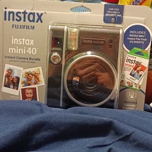 Instax mini 40 bundle (prints poliroid pictures as soon as you take them)